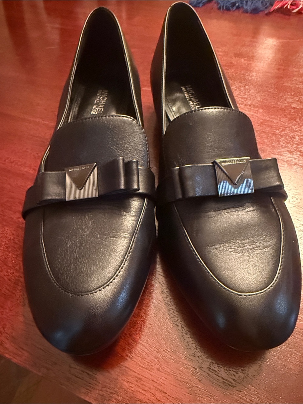 MICHAEL Michael Kors Black Leather Loafers with Bow and Logo Plaque